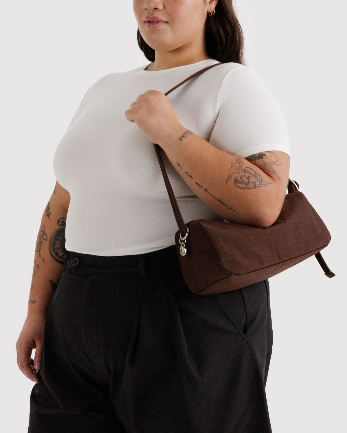 Nylon loaf bag in dark brown with shoulder strap and zip top