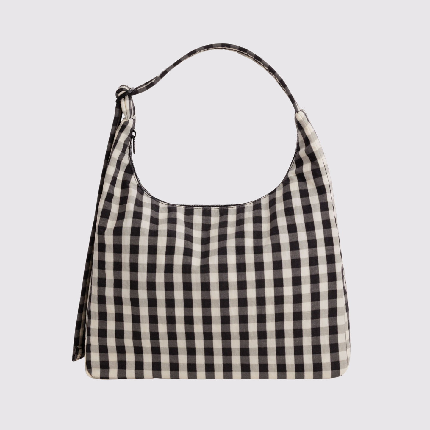 Nylon shoulder bag with black-and-white gingham print and adjustable shoulder strap.