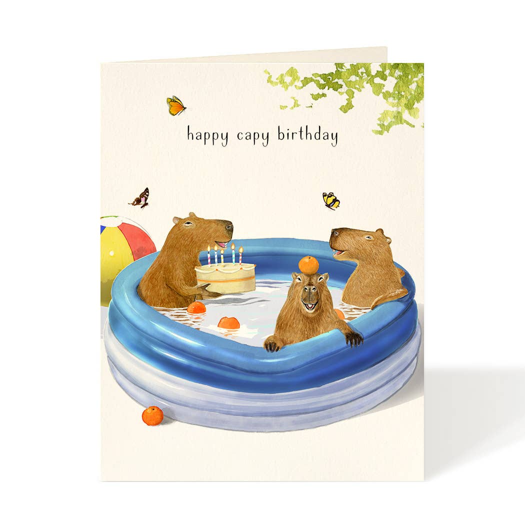 Birthday capybara card with animals around a pool, candle cake, butterflies, greeting text
