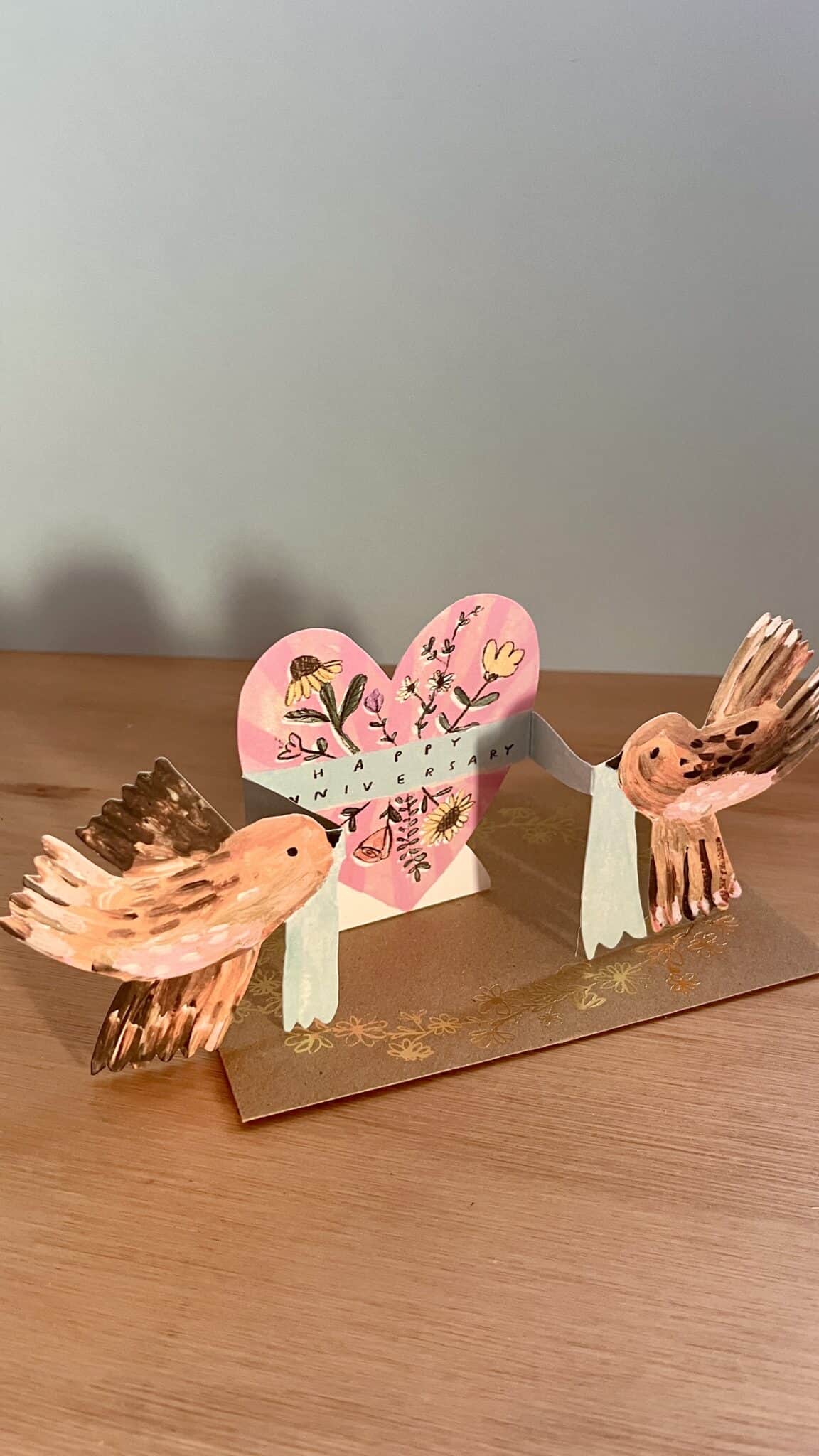 Anniversary birds greeting card with pink pop-up bird illustrations