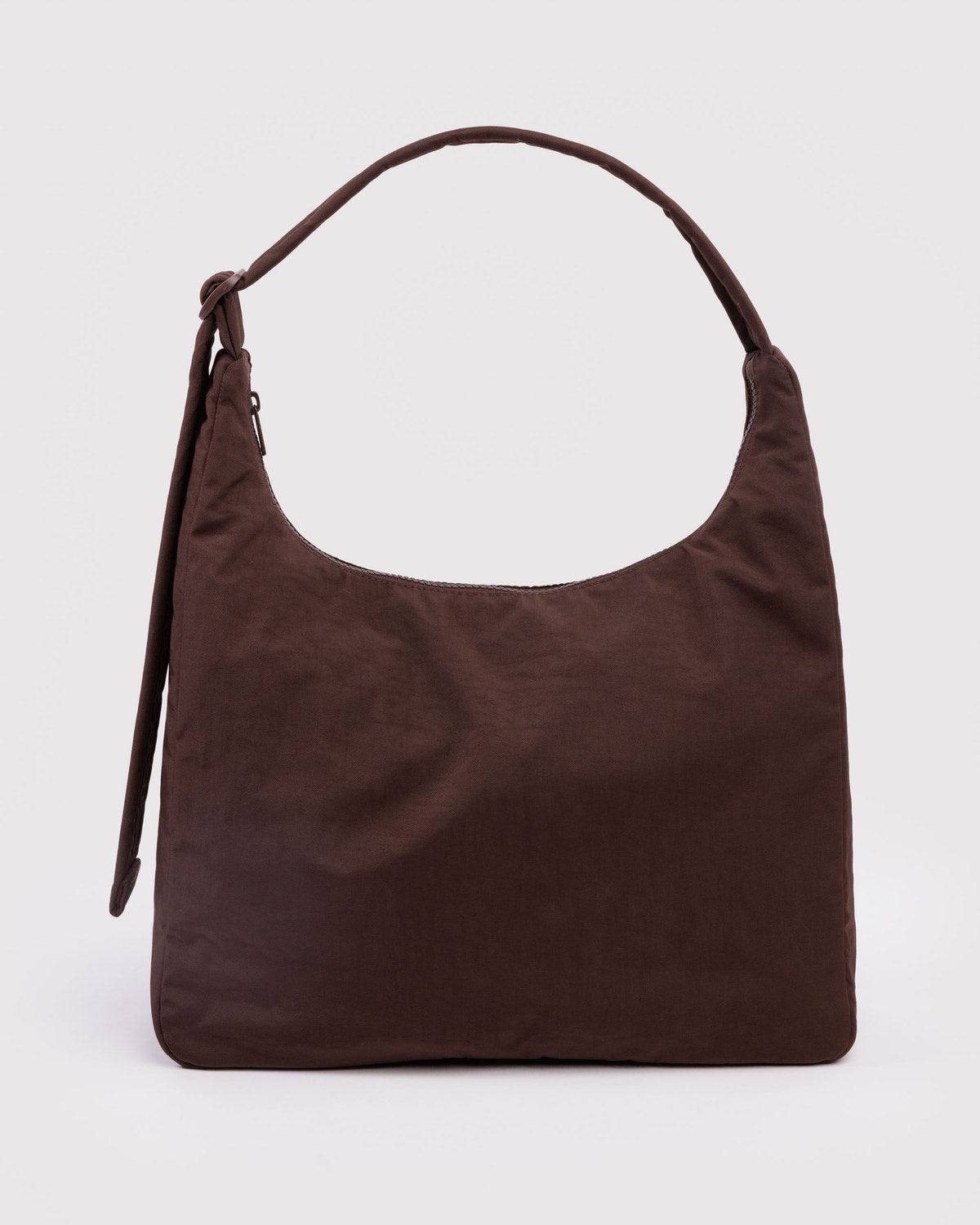 Brown nylon shoulder bag with curved top handles and side tassel detail