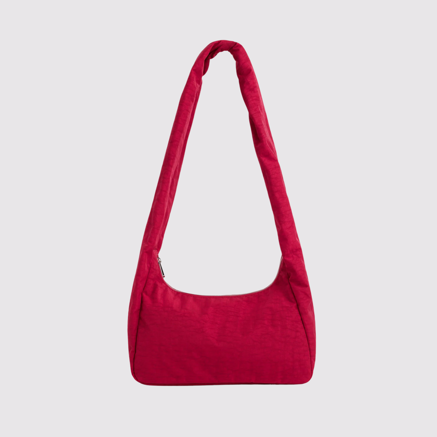 Red nylon shoulder bag with single top handle, slouchy rounded shape.