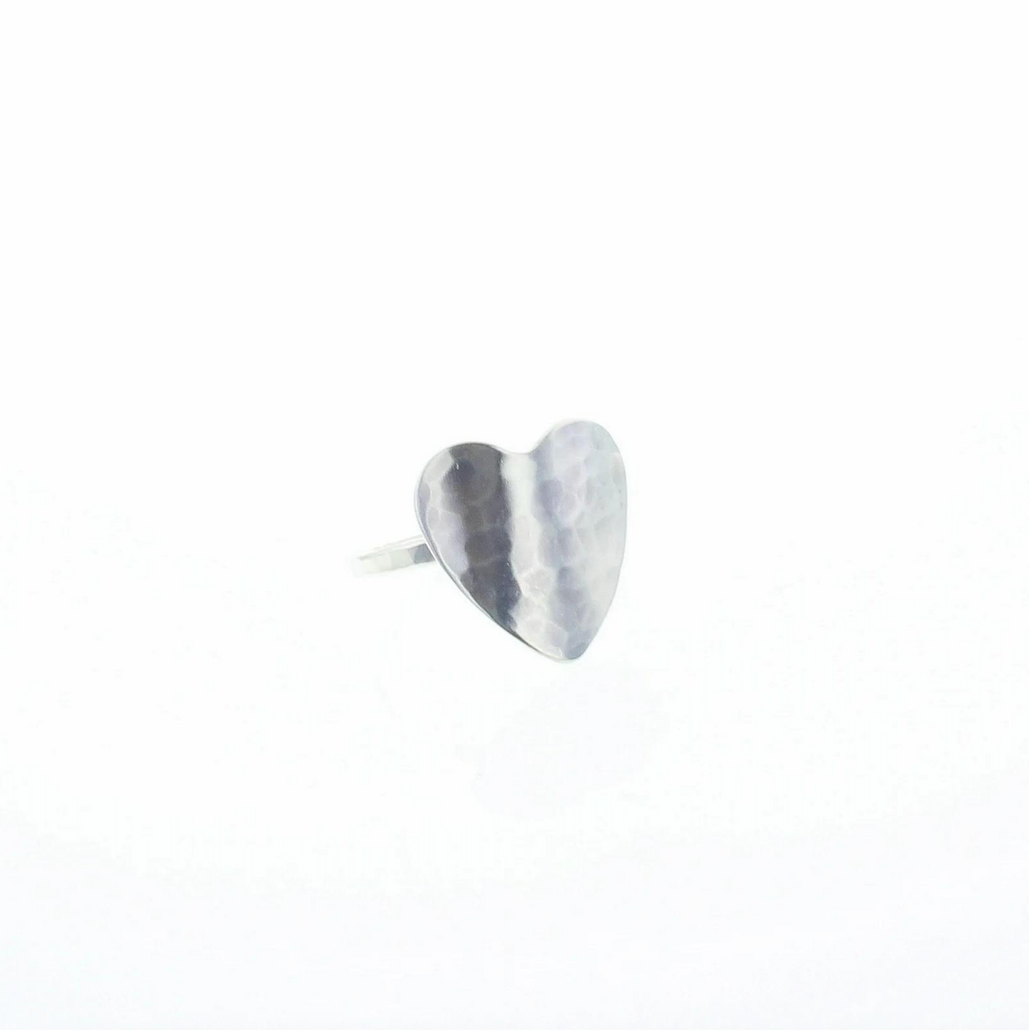 Heart-shaped sterling silver crush ring with textured crinkle finish