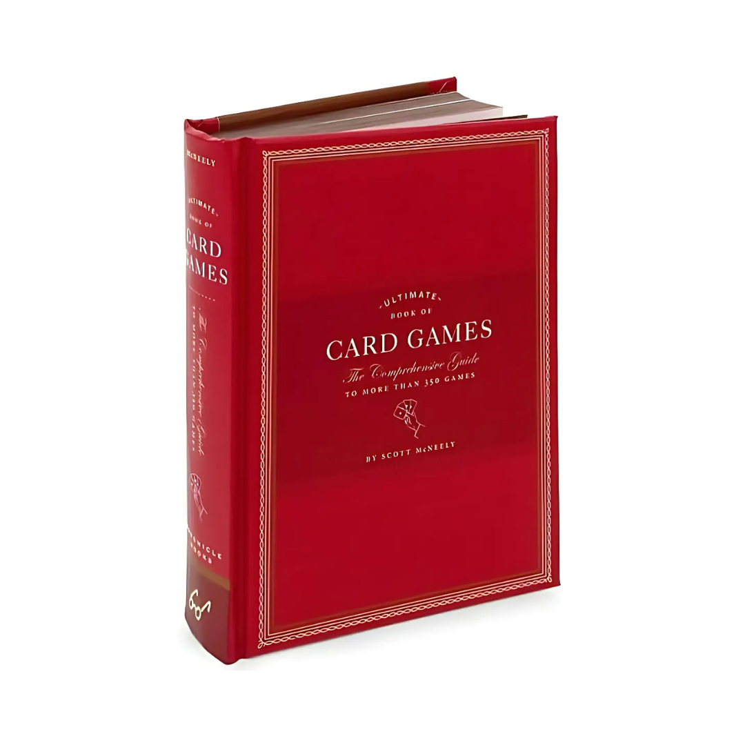 Red hardcover card games book with ornate gold border