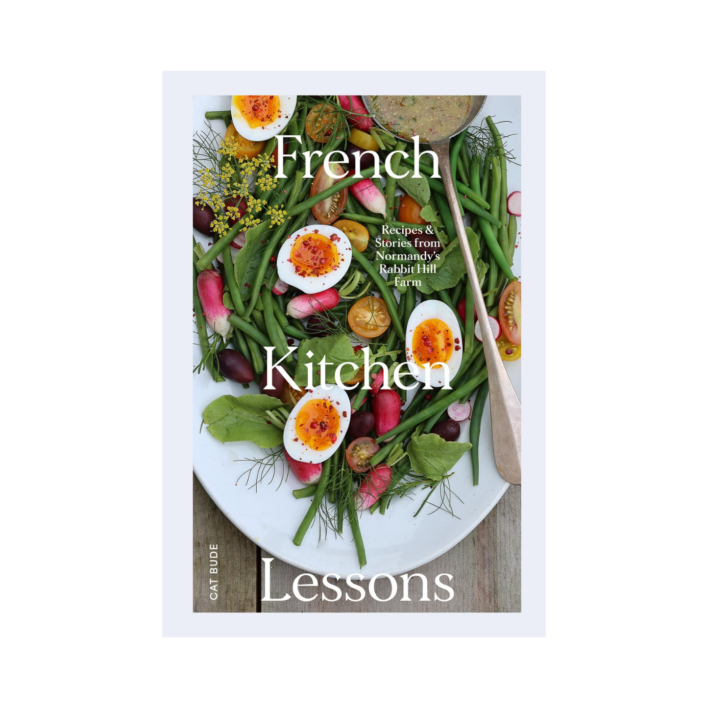 French Kitchen Lessons cookbook cover with herbs, radishes, and boiled eggs illustration