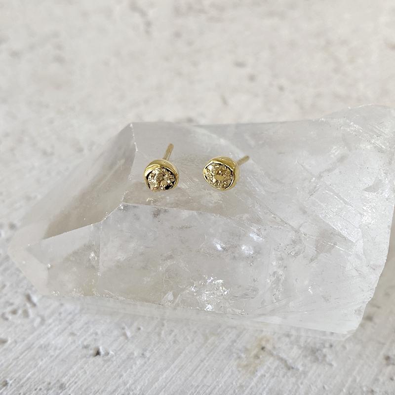 Gold-tone rough pyrite bezel stud earrings with round faceted stones