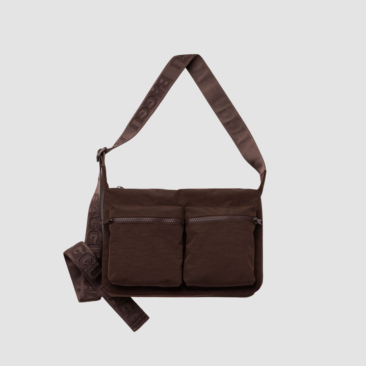 Brown medium cargo crossbody bag with two front zip pockets and adjustable strap.