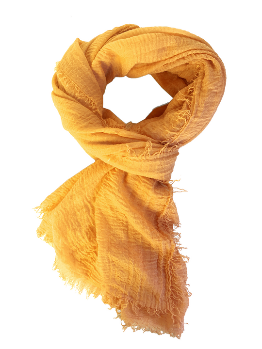 Golden yellow cotton gauze shawl with fringed ends, draped loop
