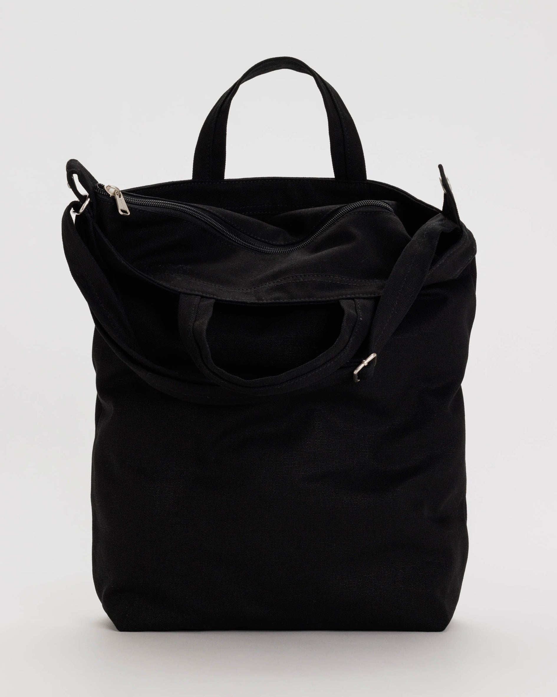 Black zip-top duck bag with dual handles and front zipper pocket