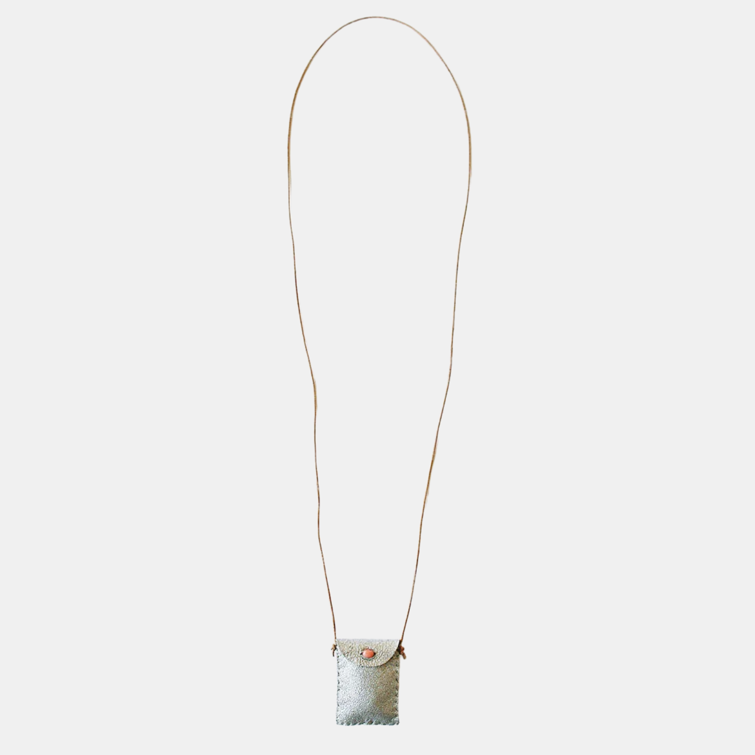 Silver-toned amulet pouch necklace with long cord and small front pouch