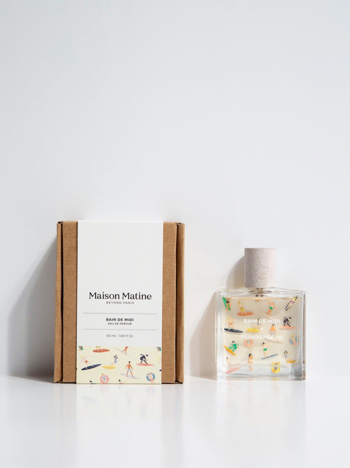 Eau de parfum bottle with matching kraft gift box and illustrated Maison Matine label