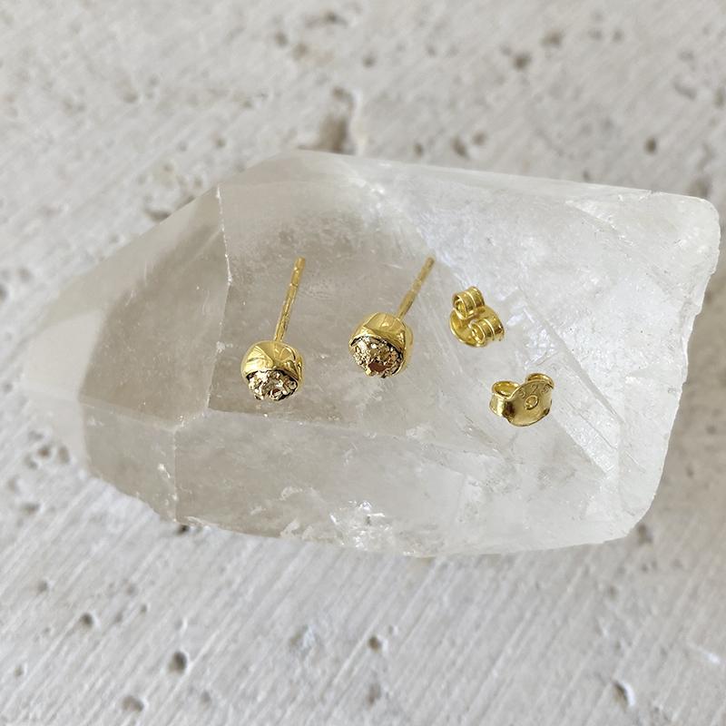 Gold-tone rough pyrite bezel stud earrings with butterfly backs