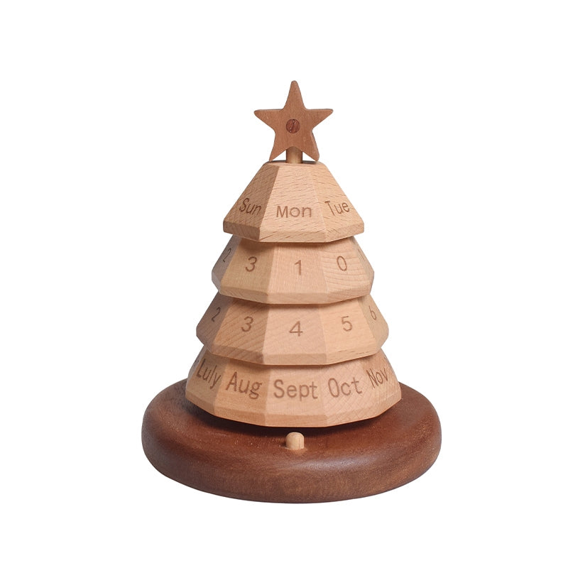 Wooden Christmas tree calendar with star top, stacked month/day blocks on round base