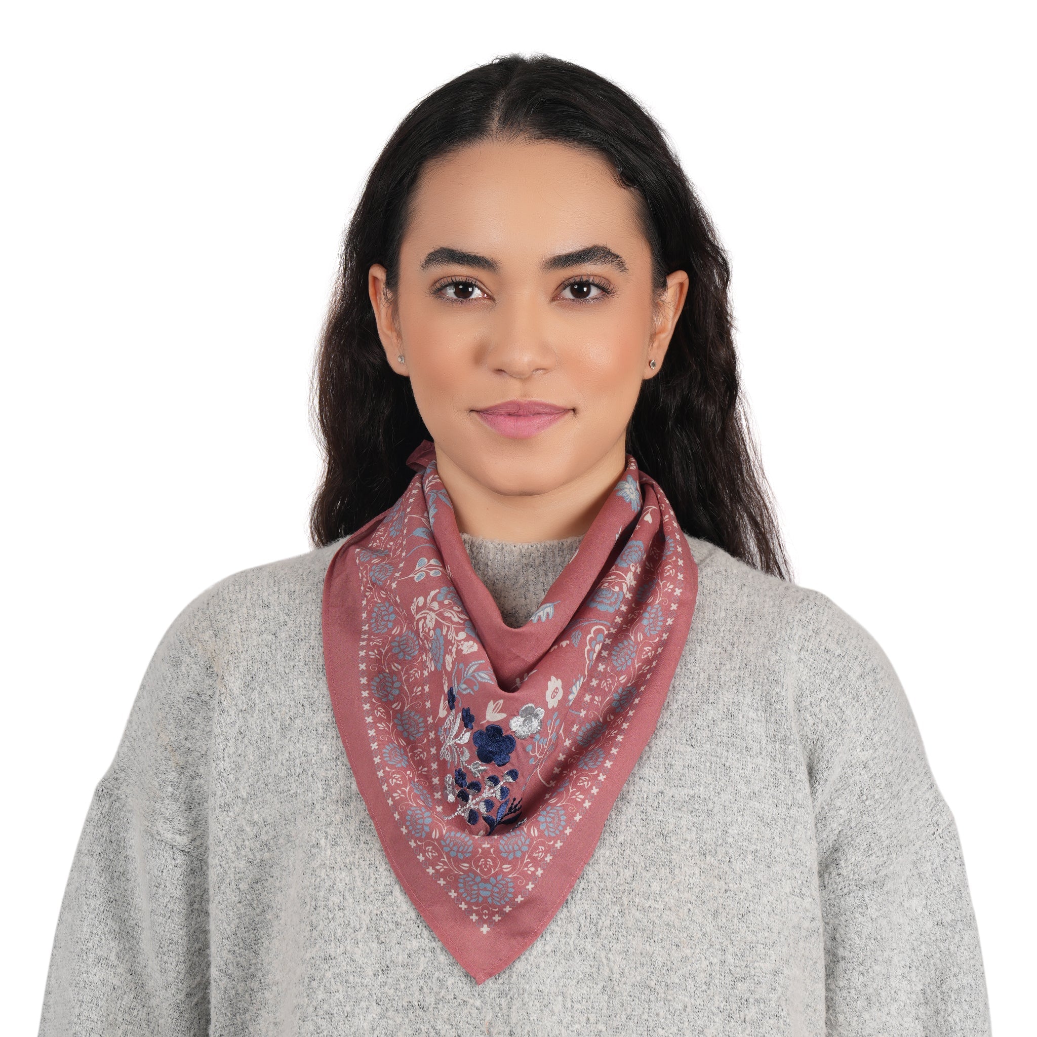 Dusty rose floral cotton scarf worn as a neck scarf with matching border