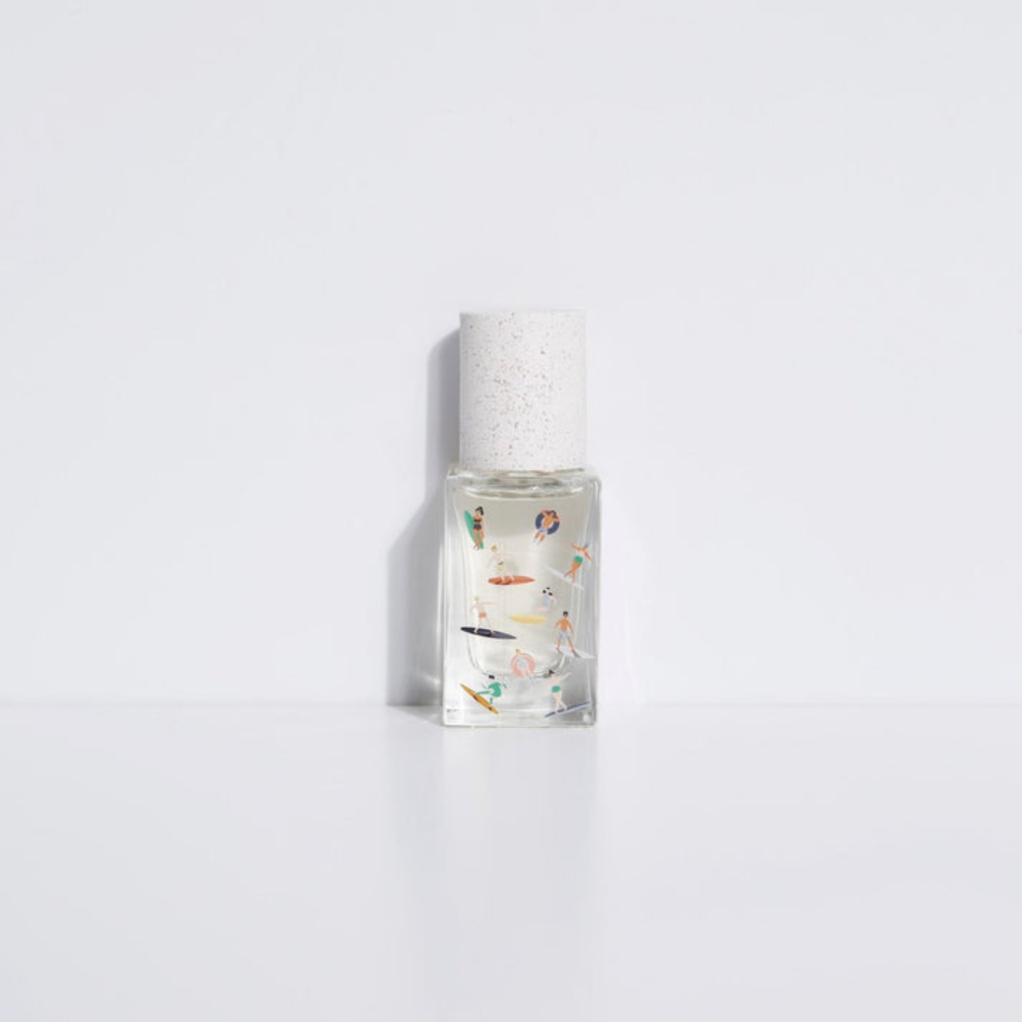 Bain de Midi eau de parfum bottle, clear glass with frosted cap and illustrated label