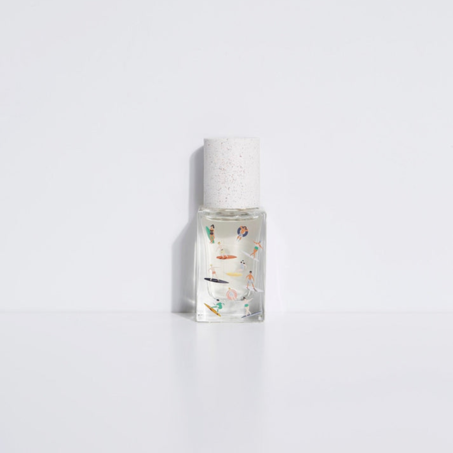 Bain de Midi eau de parfum bottle, clear glass with frosted cap and illustrated label