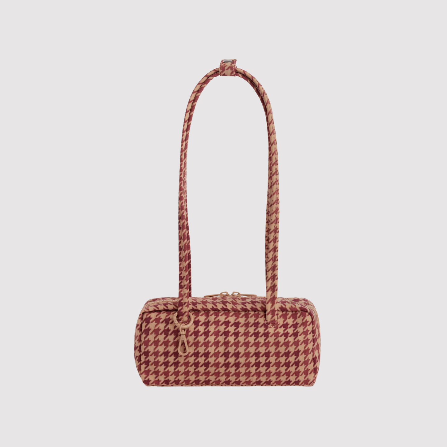 Small nylon bowler bag with tan houndstooth print and top handles.