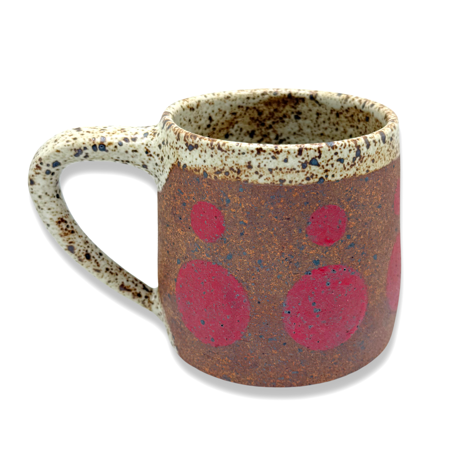 Speckled ceramic mug with red circle pattern, brown body and cream rim