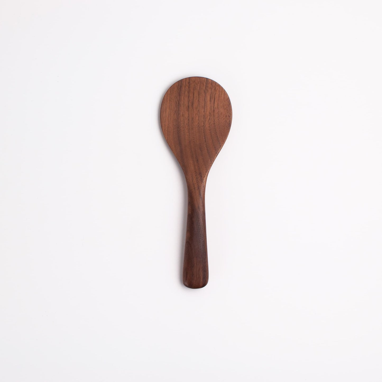 Walnut wood rice paddle with rounded scoop end and long handle