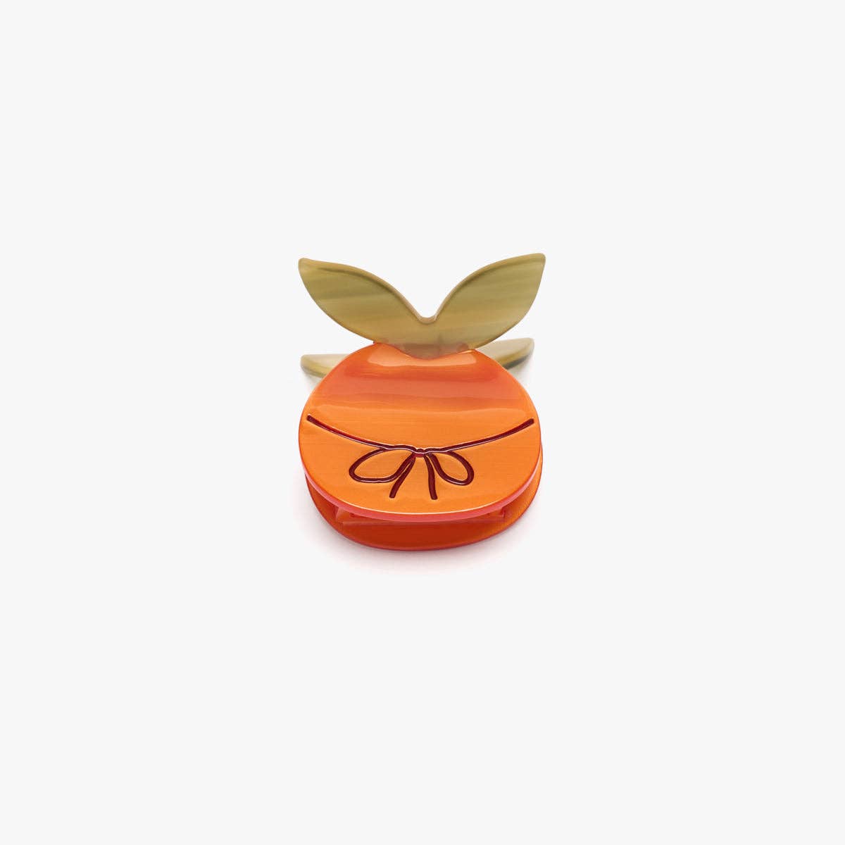 Orange mini hair claw with bow detail, stacked with olive leaf accents