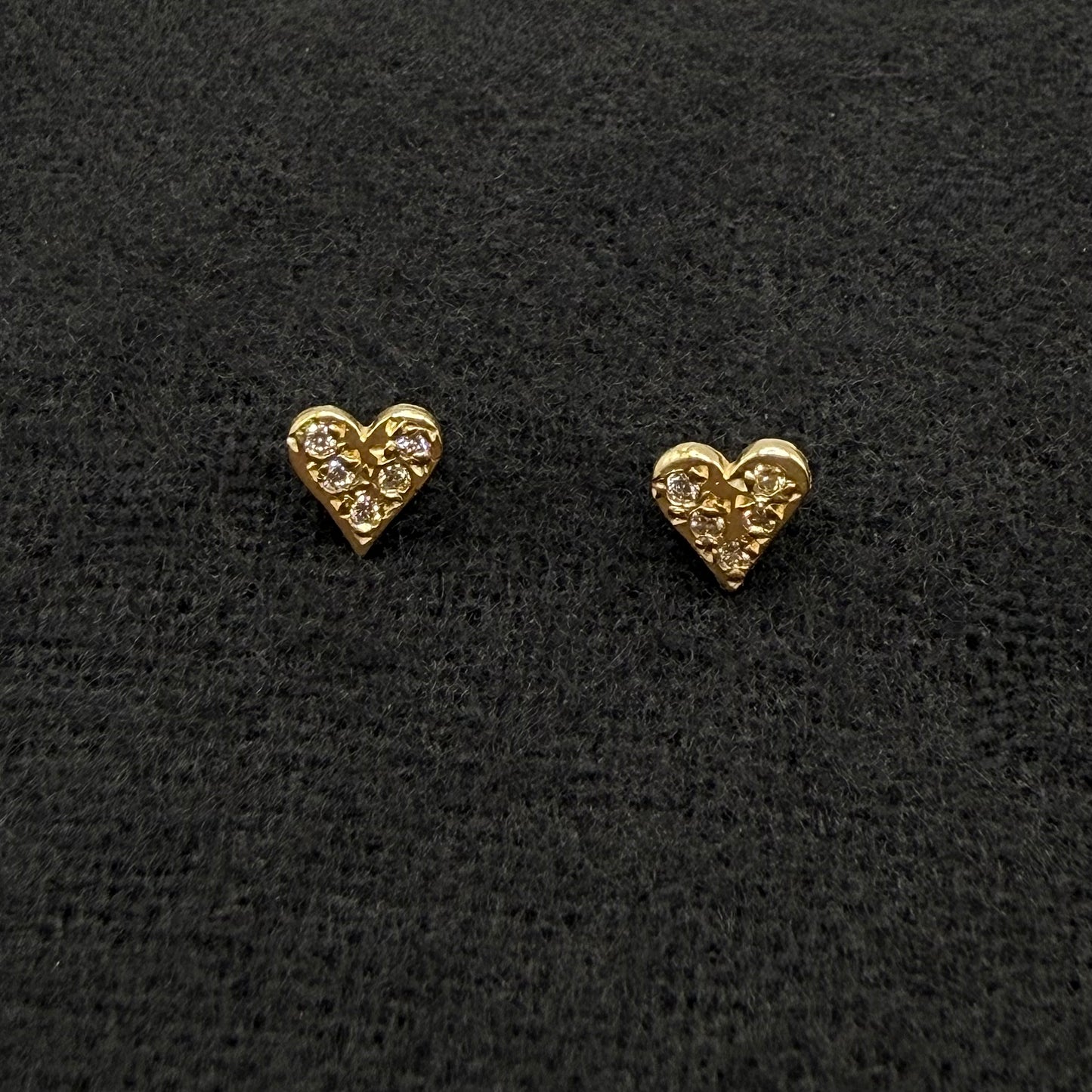 Pave diamond heart stud earrings in 14 karat gold