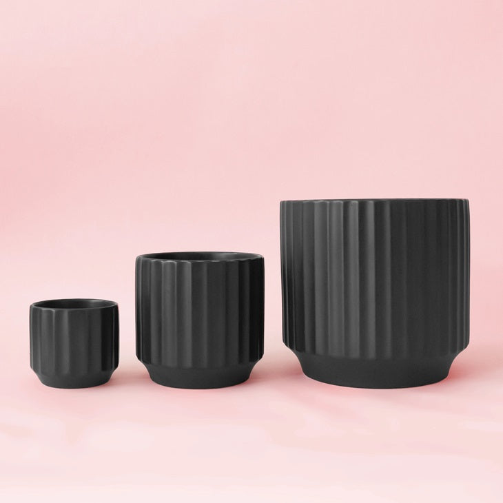 Black ribbed planters: small round pot, medium pot, and large bowl pot