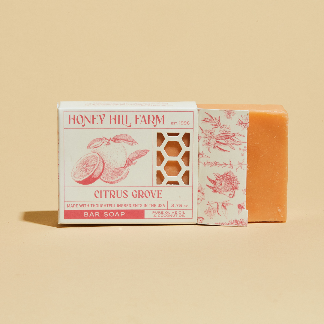 Honey Hill Farm Citrus Grove bar soap with orange bar and red floral label box.