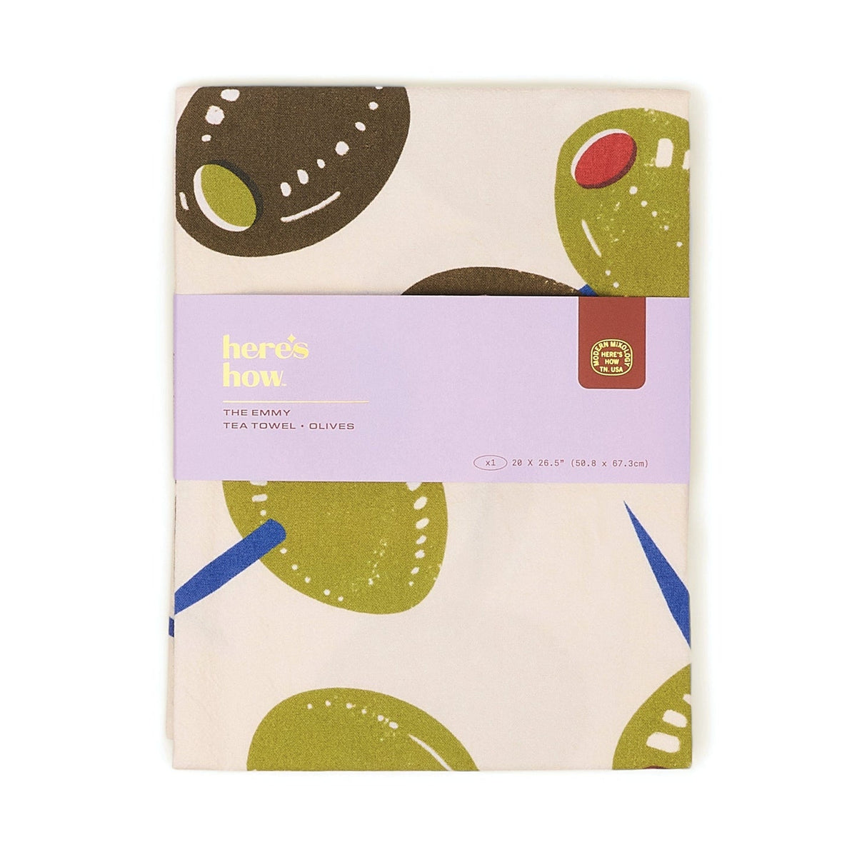 Olive print tea towel with green and brown olive slices on cream background