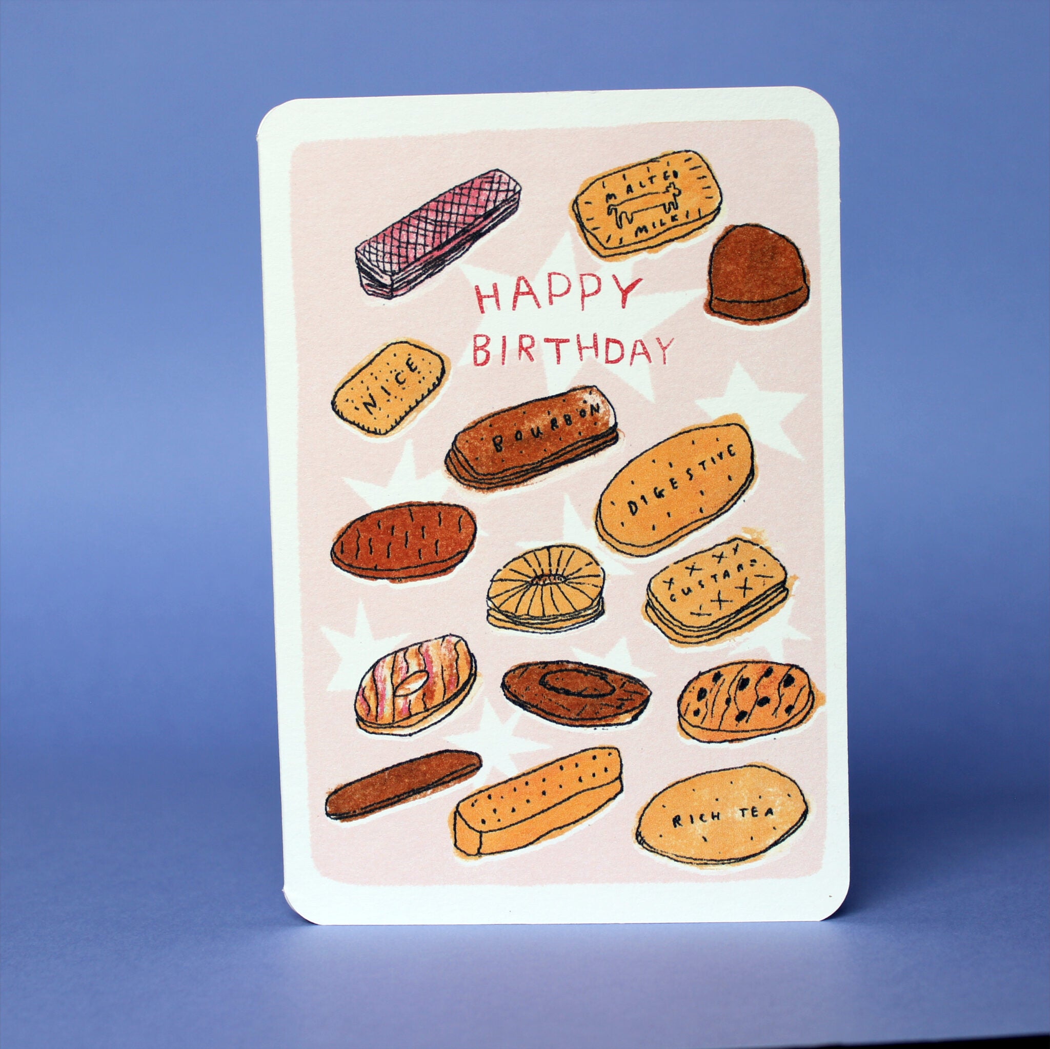 Birthday biscuits greeting card with cookie illustrations and red 'HAPPY BIRTHDAY'