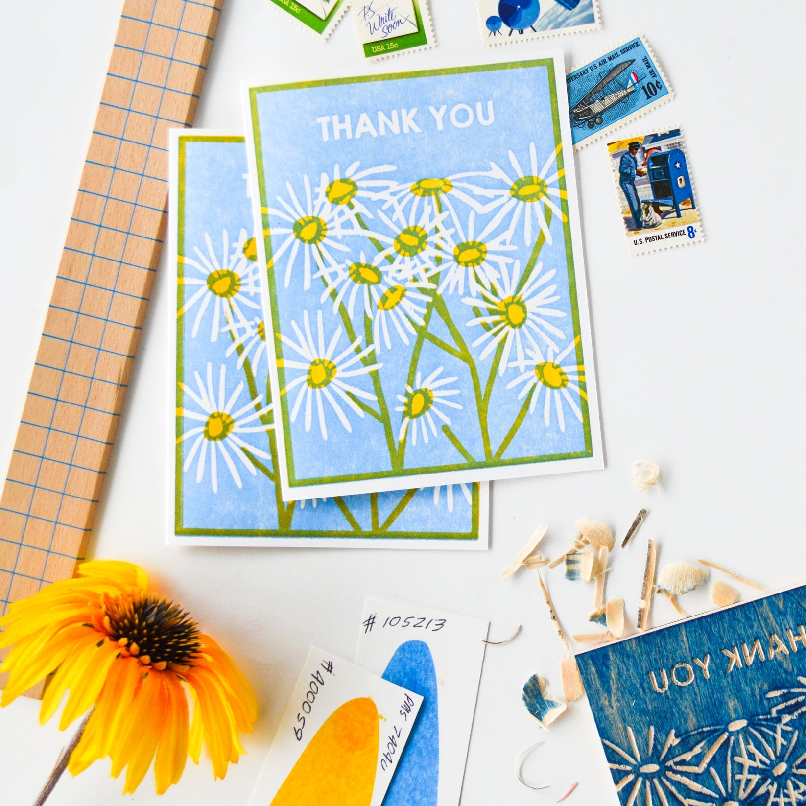 Thank you garden card with blue daisy flowers and green border