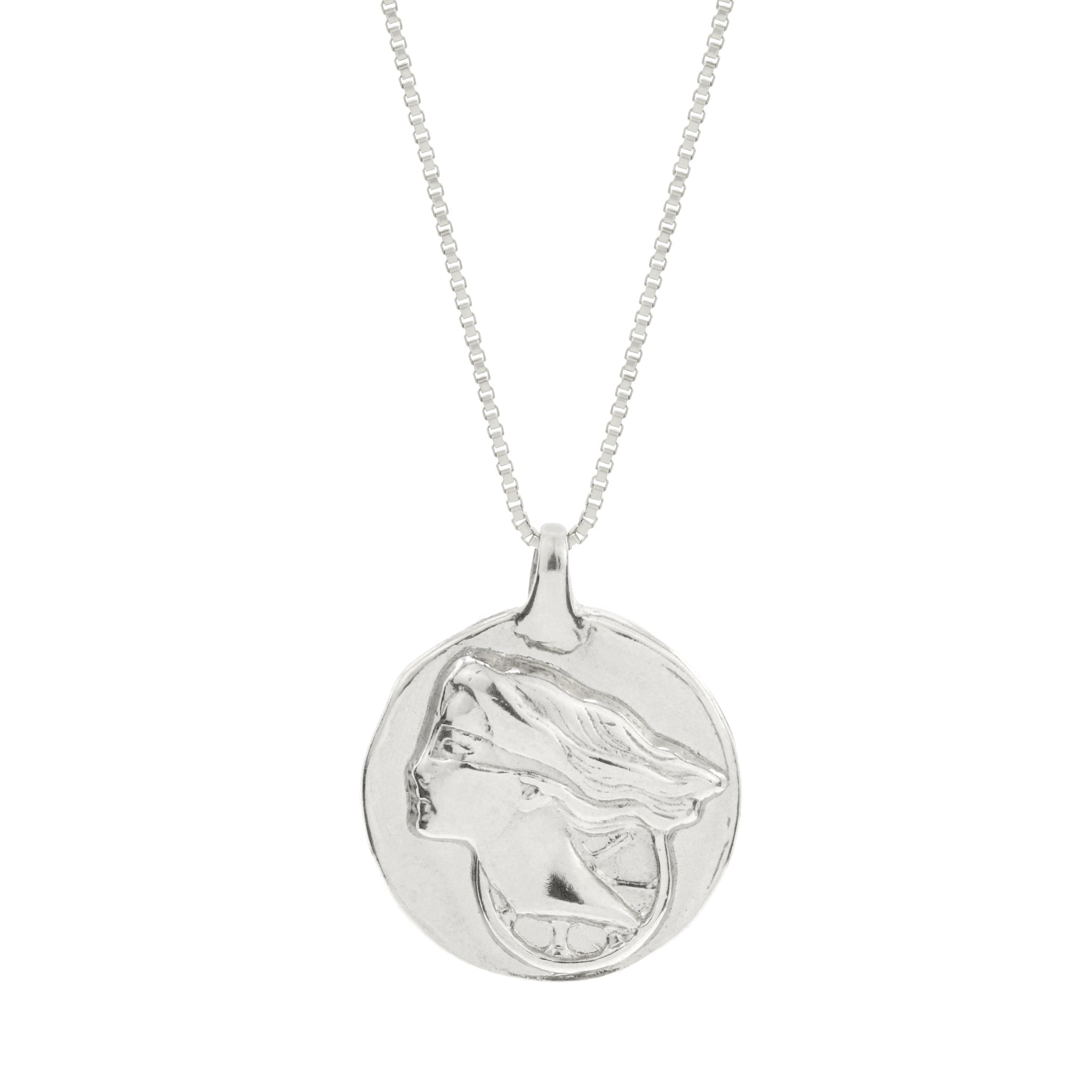 Silver pendant necklace with a round engraved medallion pendant on a bead chain