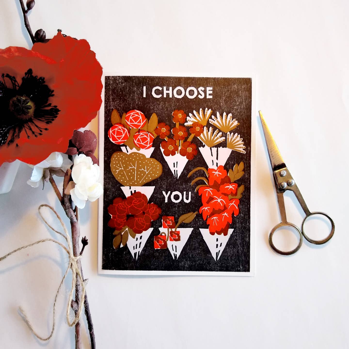 Greeting card with 'I CHOOSE YOU' text and colorful flower bouquet collage on dark cover