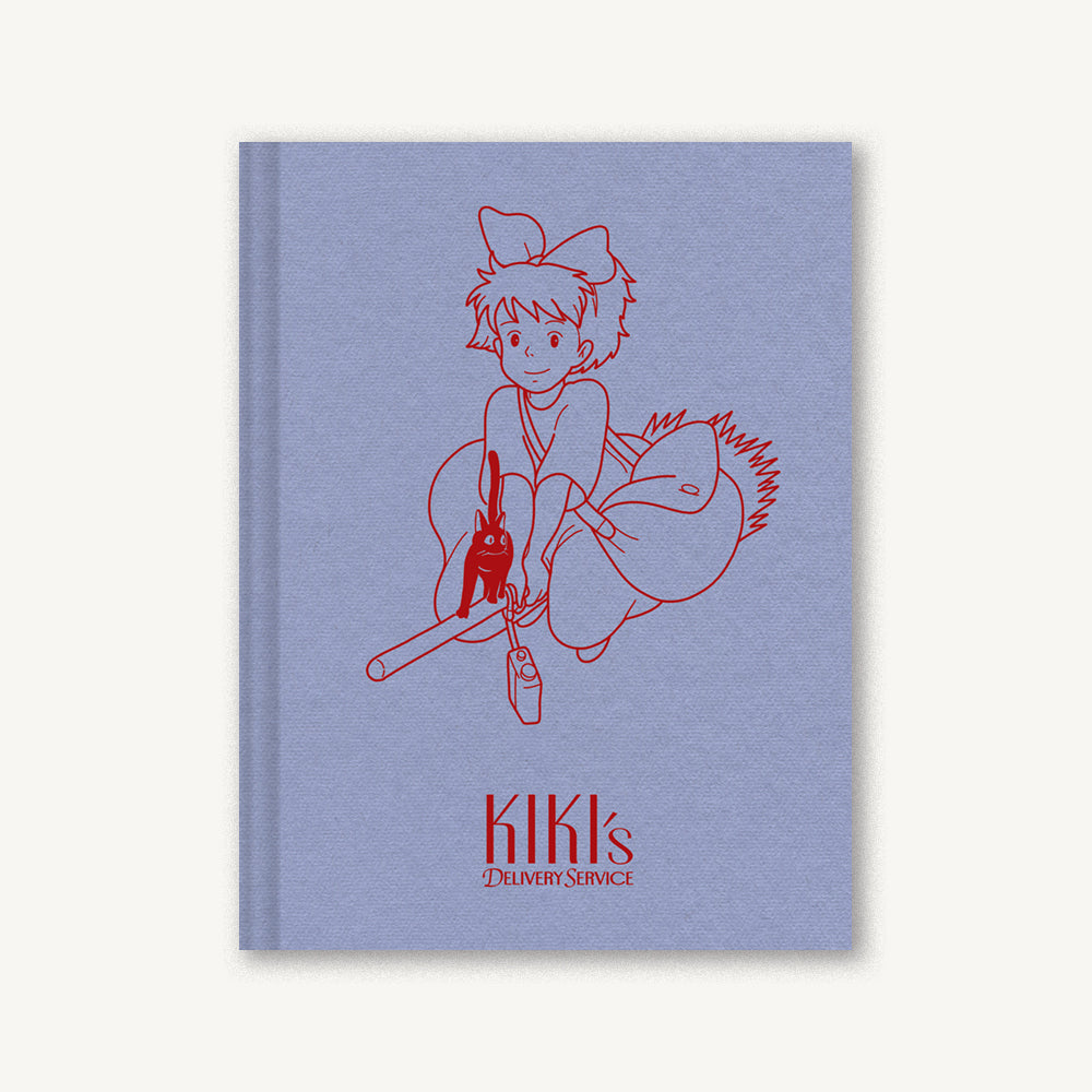 Light blue notebook with red line-art character and Kiki's Delivery Service logo on cover