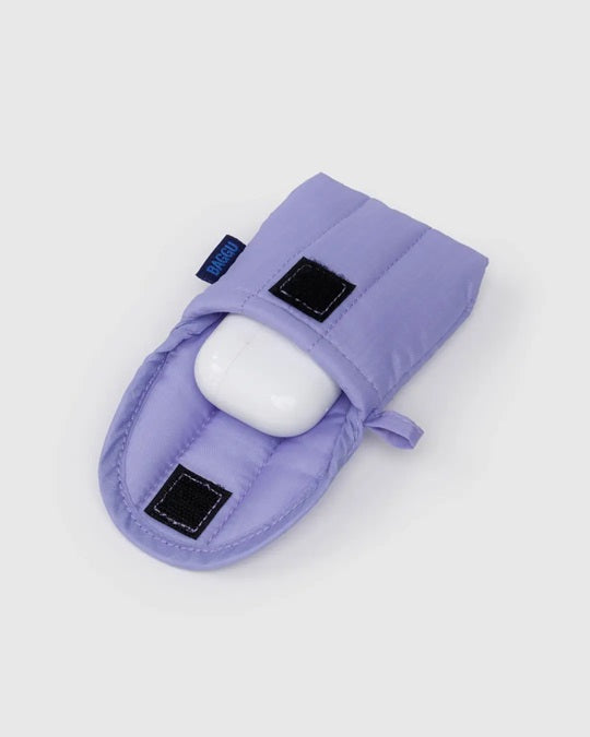 Light purple puffy earbuds case with black square patches, quilted flap, earbuds inside