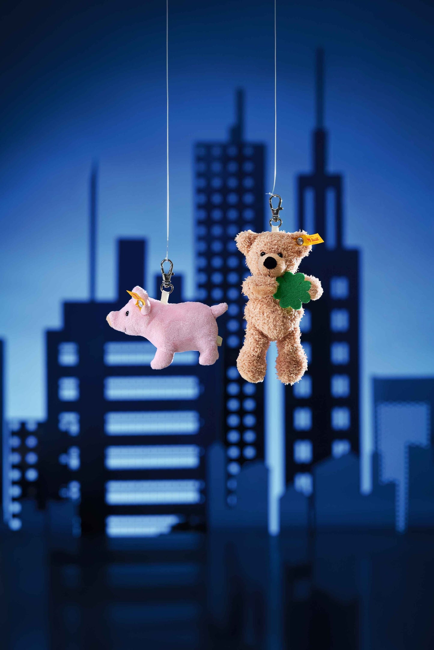 Plush pig bag charm pendant with keyrings, two hanging views