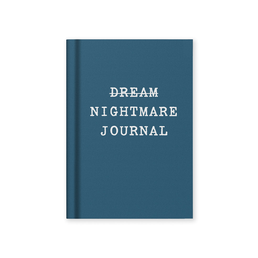 Hardback journal with blue fabric cover and white "DREAM NIGHTMARE JOURNAL" text