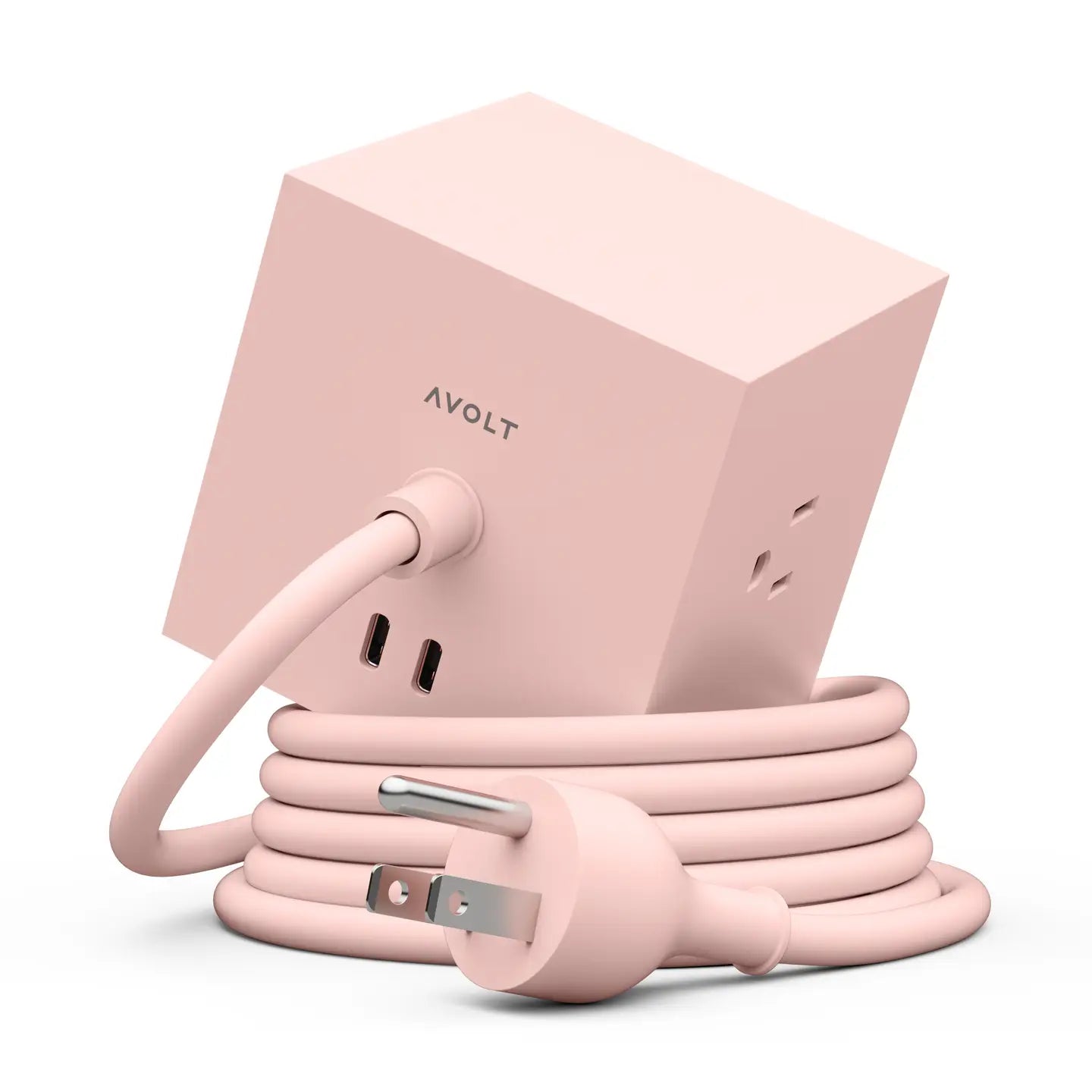 Square 1 extension cord set in blush pink with 3-prong outlets and coiled cable