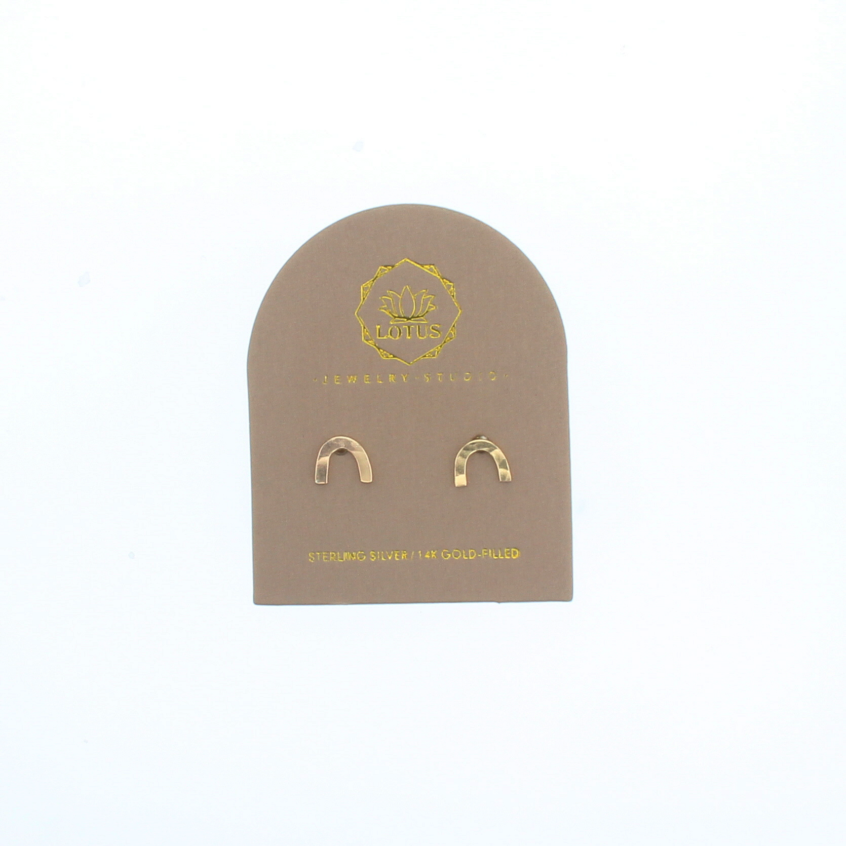Gold-tone rainbow stud earrings on display card