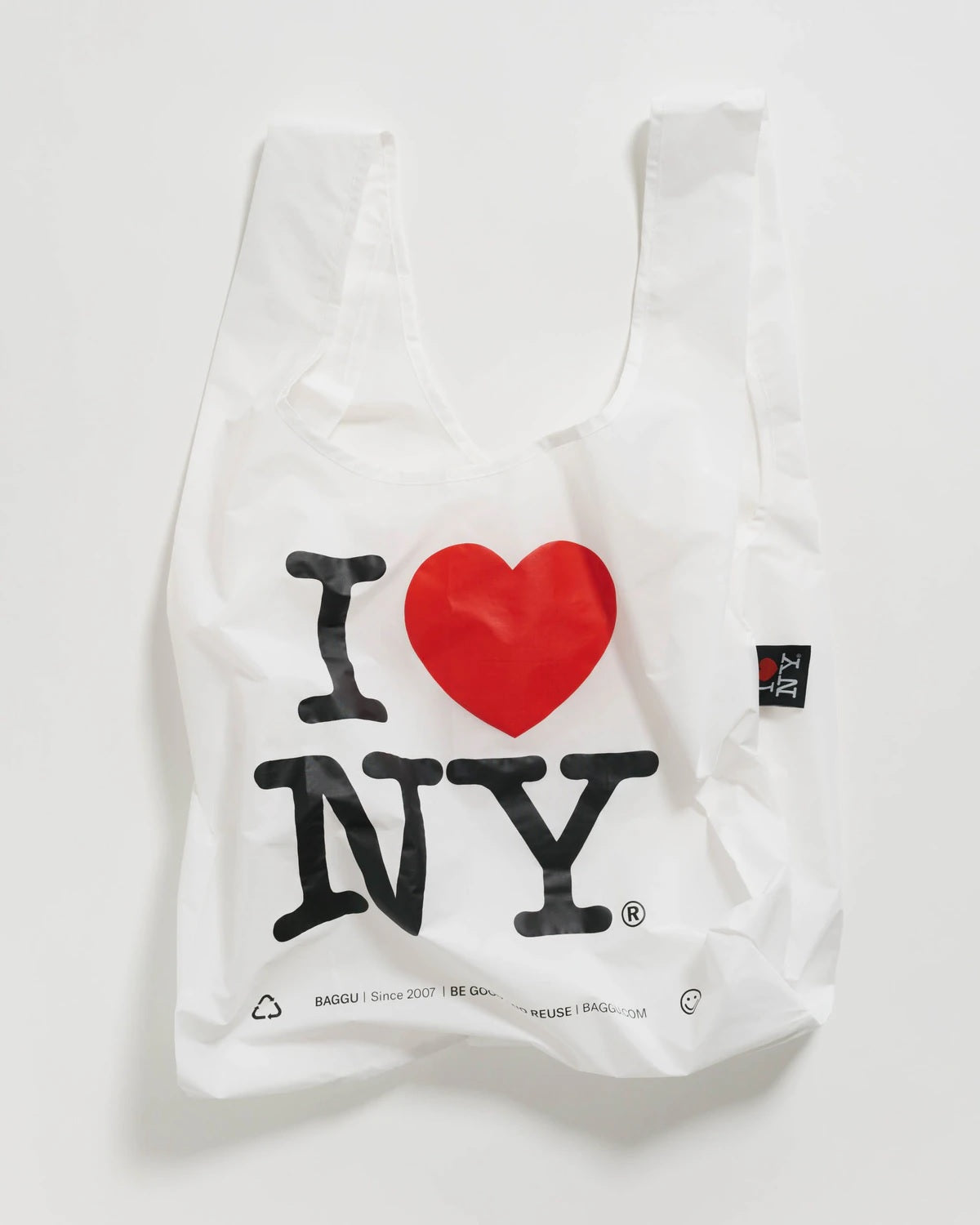 Reusable tote bag with black “I ♥ NY” text and red heart