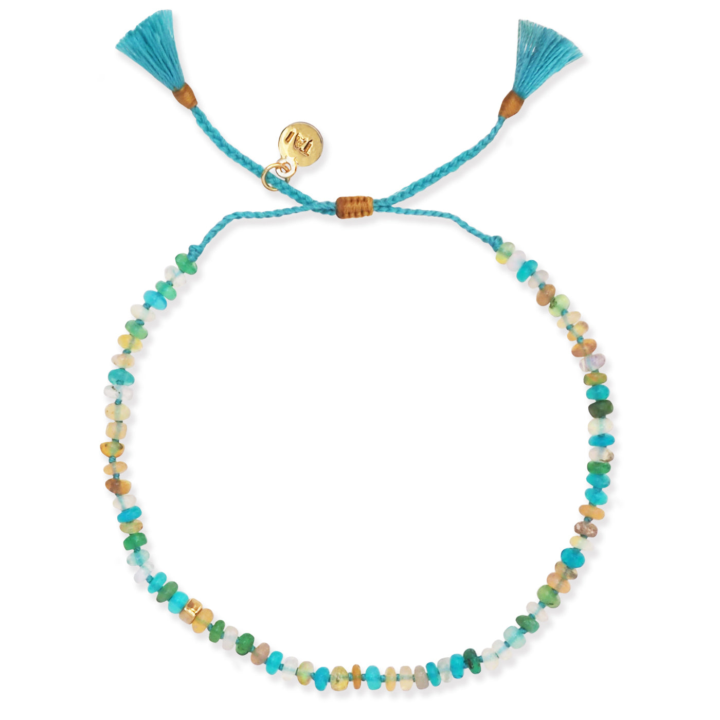 Turquoise cord multistone bracelet with heart toggle charm and tassel ends