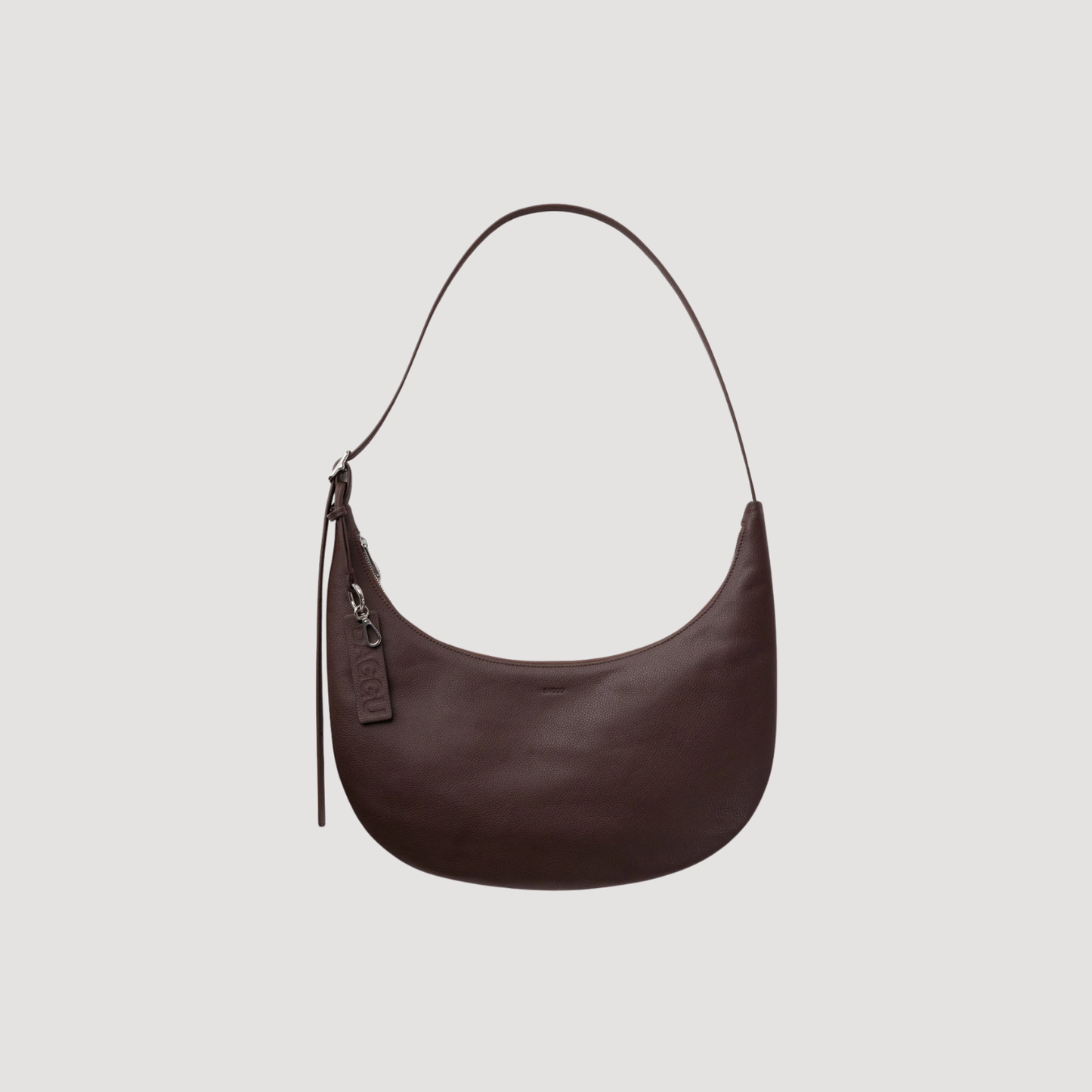 Medium crescent hobo bag in dark brown recycled leather, zip top and hanging tassel