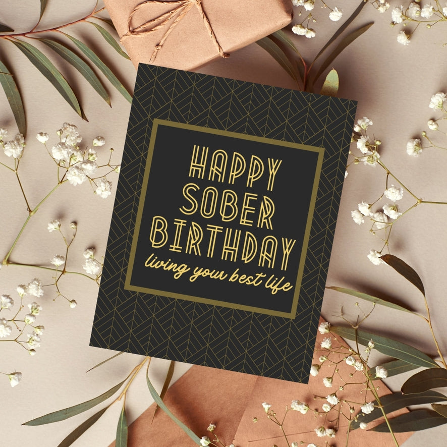 Sober birthday greeting card with gold lettering: 'Happy Sober Birthday' and 'living your best life'