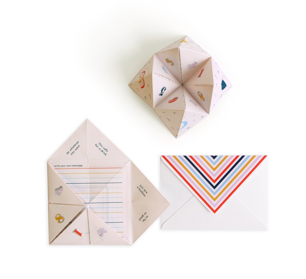 Pop-up greeting card showing folded and expanded paper panels with colorful icons