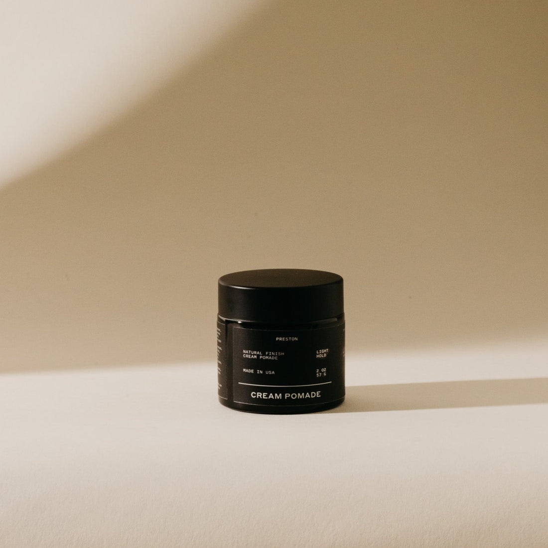 Unscented cream pomade jar, dark container with black lid