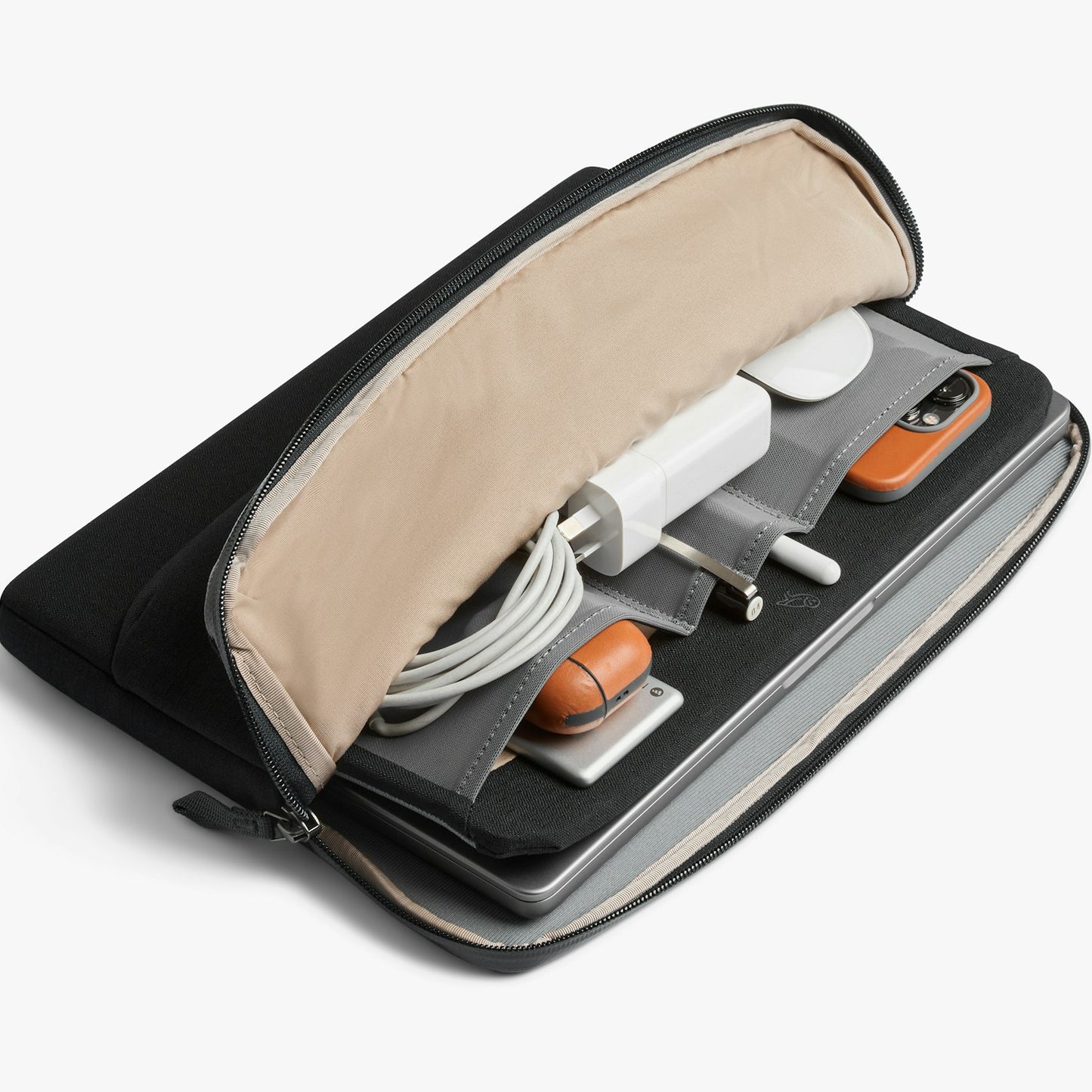 Black laptop caddy with zipped compartments, holding devices and cables