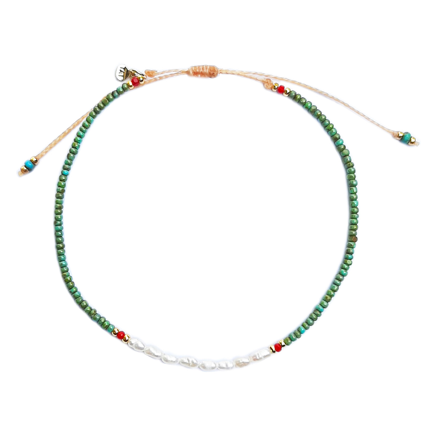 Beaded bracelet with green beads, white pearl accents, and small multicolor charms