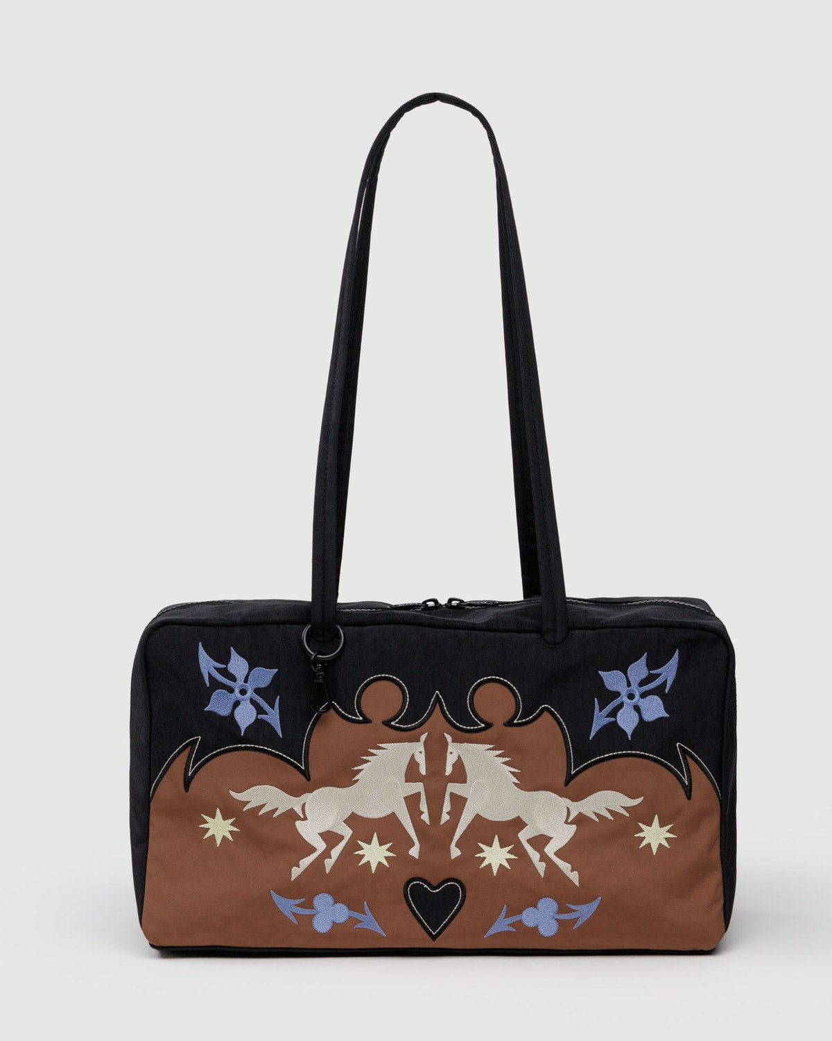 Medium nylon bowler bag in black and brown with colorful graphic print and top handles.