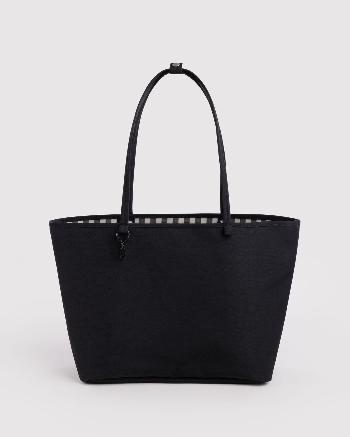 Large nylon reversible tote in solid black with top handles