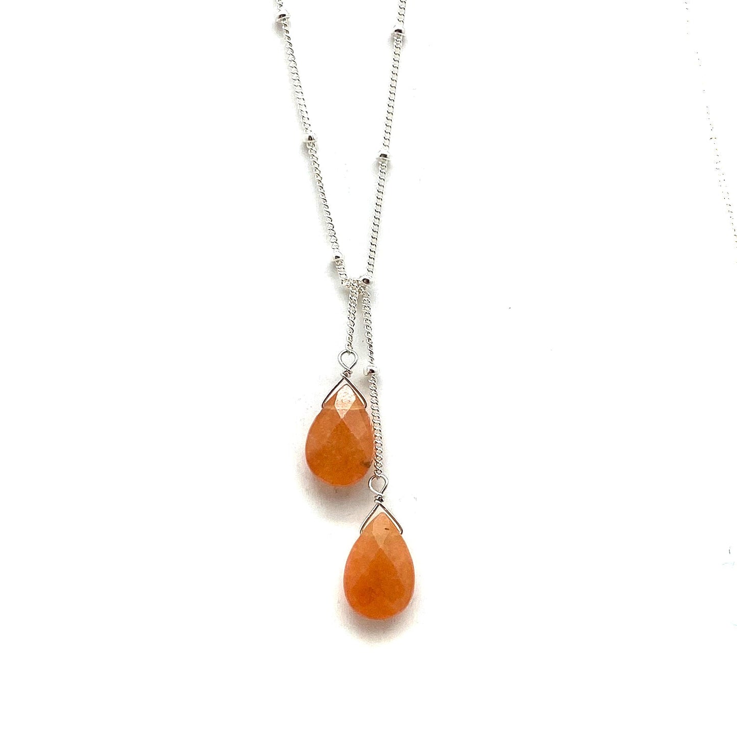 Sterling silver lariat necklace with two orange teardrop stones