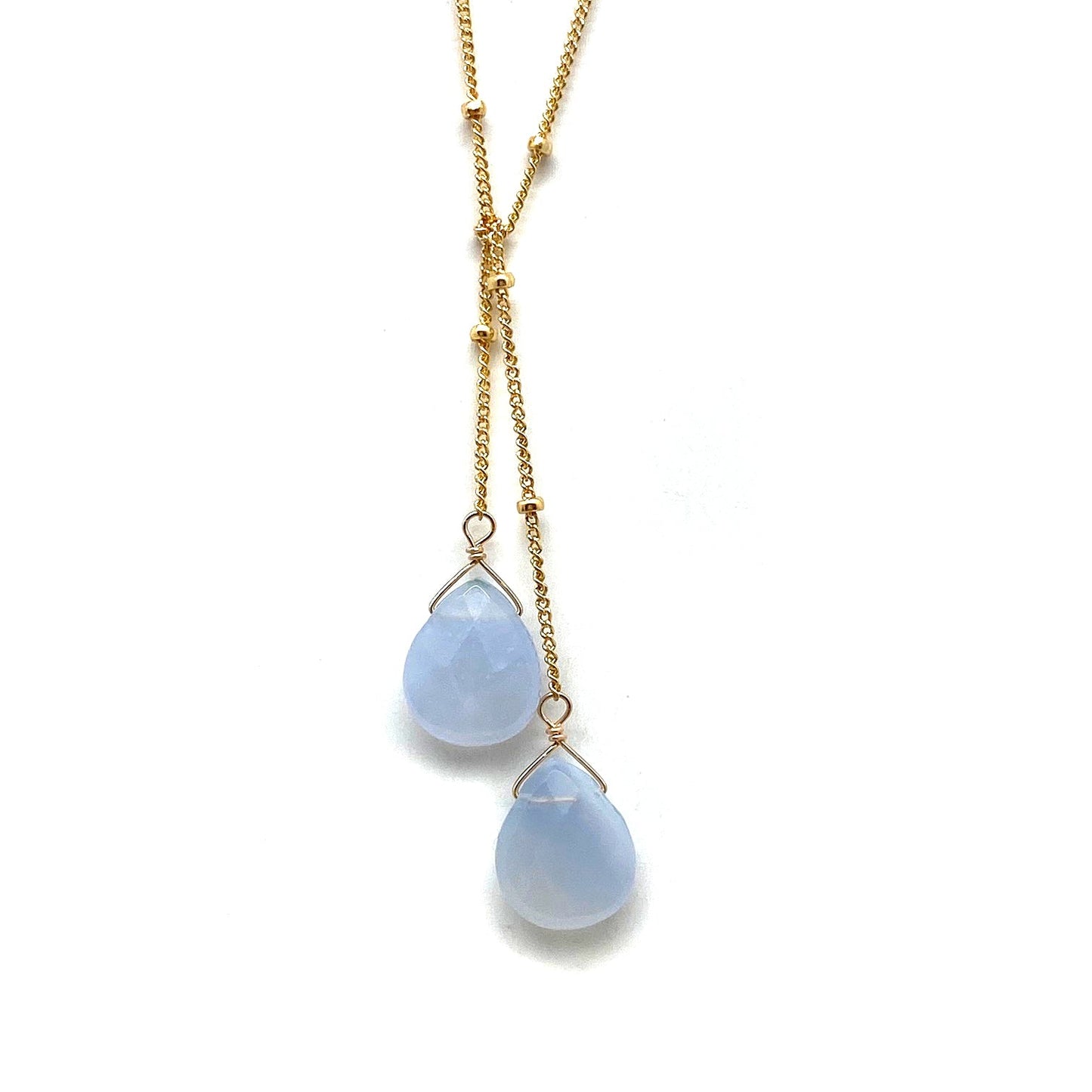 Gold-filled lariat necklace with two light blue teardrop stone drops